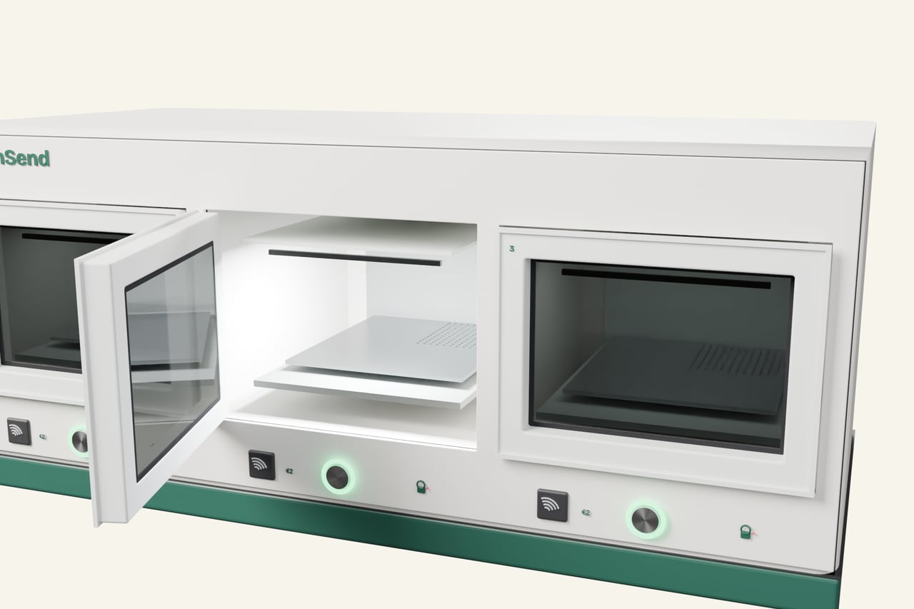 Open compartment showing the smoked-glass door, contactless pad, perforated shelf, rear grille and UV diffuser strip